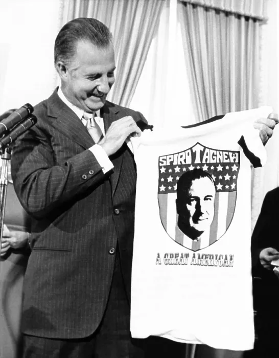 Framed Print : Vice President Spiro Agnew admires a T-shirt presented him Framed Print : Vice President Spiro Agnew admires a T-shirt presented him