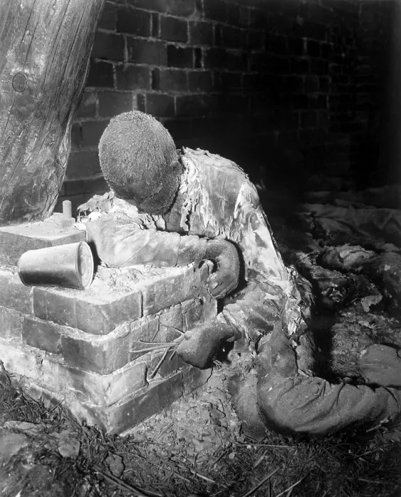 Framed Print : A victim of the Gardelegen massacre of April 13, 1945. German SS and Luftwaffe troops forced 1, 016 weakened slave laborers into a large barn that they then set on fire