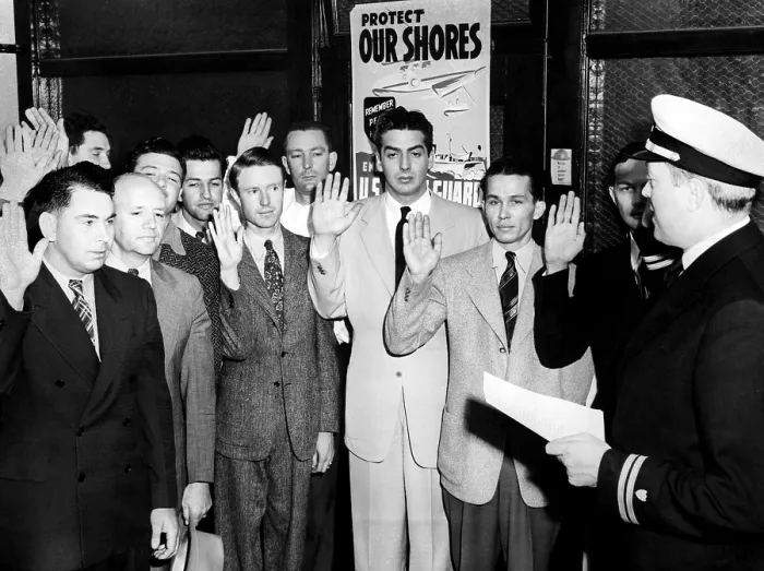 Framed Print : Victor Mature (center), American film actor, enlisting in the Coast Guard, National Airport, Virginia, 1943.. Courtesy: CSU Archives  /  Everett Collection
