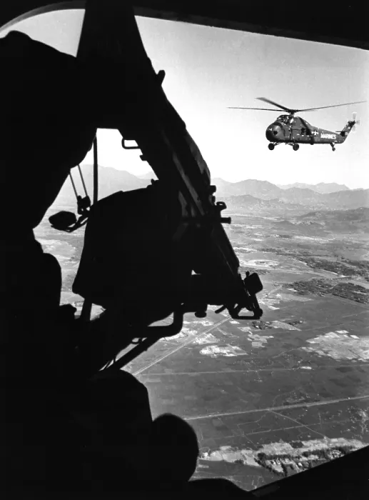 Framed Print : Vietnam War. US Army Helicopter in flight viewed from behind the door gunner of a companion helicopter. Ca. 1965 Framed Print : Vietnam War. US Army Helicopter in flight viewed from behind the door gunner of a companion helicopter. Ca. 1965