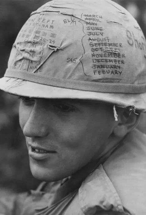 Framed Print : Vietnam War. A US Army sky trooper helmet keeps track of the months time he has left on his thirteen month tour of duty. February 1968 Framed Print : Vietnam War. A US Army sky trooper helmet keeps track of the months time he has left on his thirteen month tour of duty. February 1968