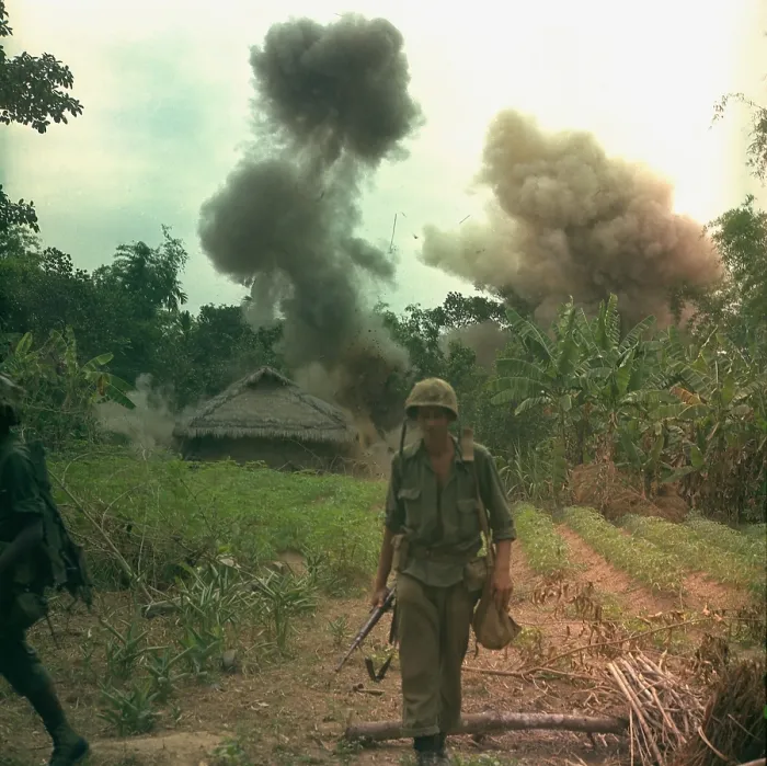 Framed Print : Vietnam War. US Marines walk away from blown up bunkers and tunnels used by the Viet Cong