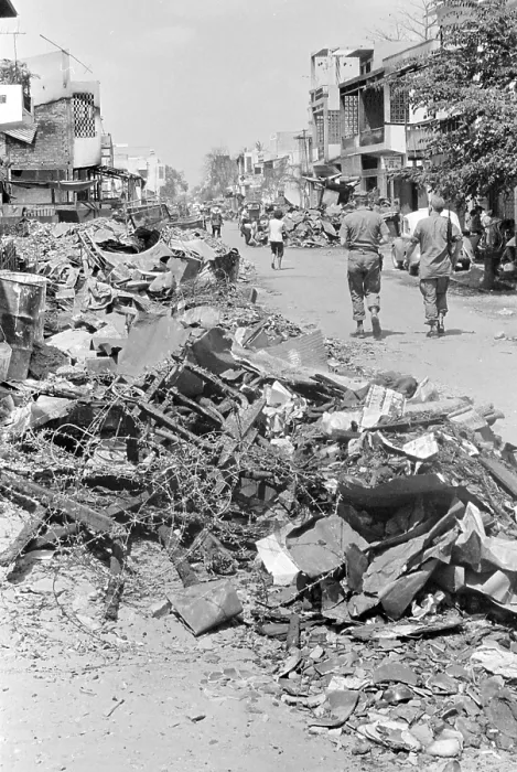 Framed Print : Vietnam War, Saigon, Vietnam, rubble and the remains of barbed wire line the streets of Cholon Framed Print : Vietnam War, Saigon, Vietnam, rubble and the remains of barbed wire line the streets of Cholon