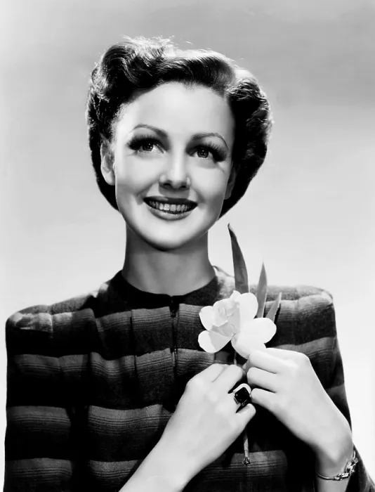 Framed Print : Virginia Grey, wearing a jasper ring and daffodils to signify her March birthday, 1942 Framed Print : Virginia Grey, wearing a jasper ring and daffodils to signify her March birthday, 1942