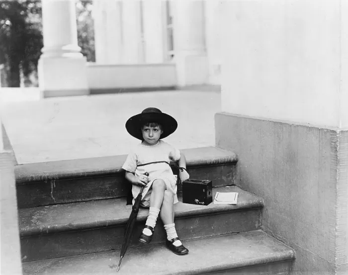 Framed Print : Waiting for the President, a young girl sits on the White House steps with a camera by her side waiting for President Warren G. Harding, photograph by Mrs. W Framed Print : Waiting for the President, a young girl sits on the White House steps with a camera by her side waiting for President Warren G. Harding, photograph by Mrs. W