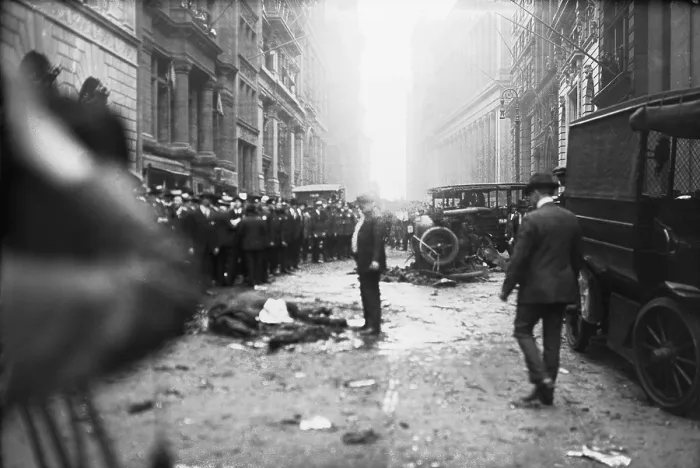 Framed Print : The Wall Street Bombing. A man stands over a dead horse, after the explosion in front of J.P. Morgan & Co. office at Broad and Wall Streets Framed Print : The Wall Street Bombing. A man stands over a dead horse, after the explosion in front of J.P. Morgan & Co. office at Broad and Wall Streets