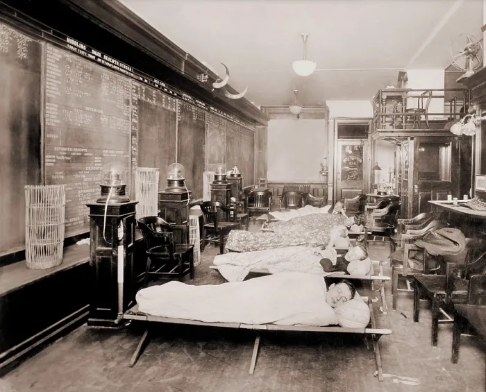 Framed Print : Wall Street clerks sleeping in office due to excessive work caused by heavy stock trading. New York City, October 23, 1915