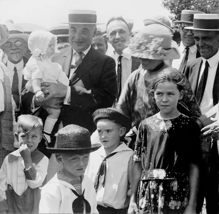 Framed Print : Warren G. Harding (1865-1923), holds the baby and talks to the farmers, Hutchinson, Kansas during his 1923 Western tour Framed Print : Warren G. Harding (1865-1923), holds the baby and talks to the farmers, Hutchinson, Kansas during his 1923 Western tour