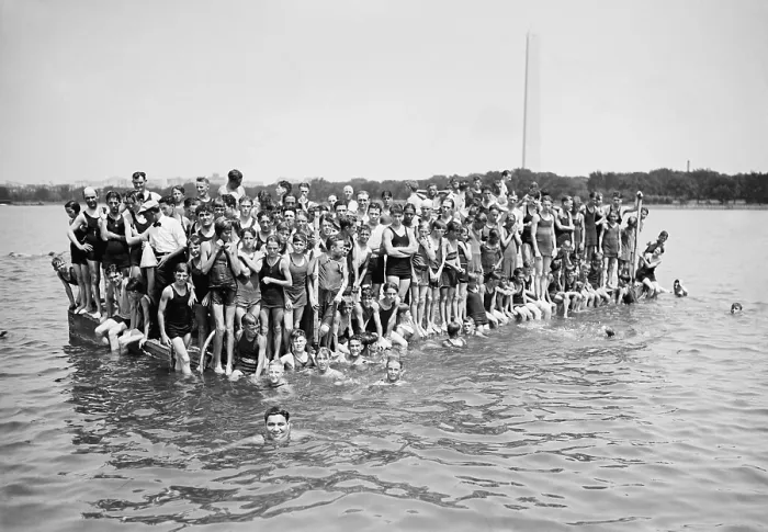 Framed Print : Warren Kealoha (lower left), Hawaiian Olympic swimmer, is cheered by swimmers at the Tidal Basin. Washington, D.C. Aug. 24, 1924