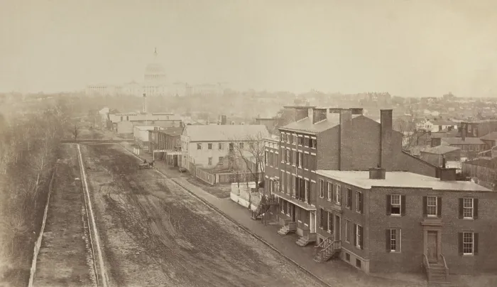 Framed Print : Wartime Washington, DC. An April 1865 photograph shows Maine Ave. SW, looking northeast towards Capitol