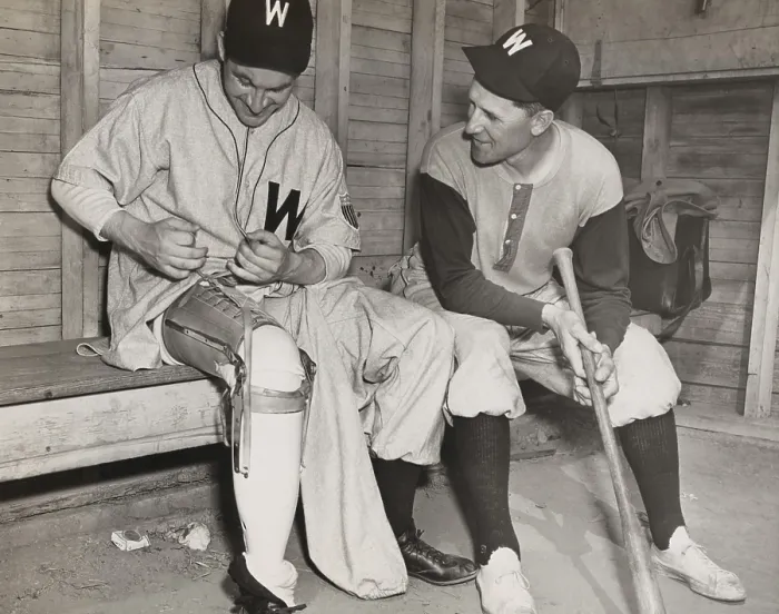 Framed Print : Washington Senators pitcher, Lt. Bert R. Shepard, as Manager Ossie Bluege looks on. March 30, 1945. The veteran pilot lost his lower right leg in WW2 Framed Print : Washington Senators pitcher, Lt. Bert R. Shepard, as Manager Ossie Bluege looks on. March 30, 1945. The veteran pilot lost his lower right leg in WW2