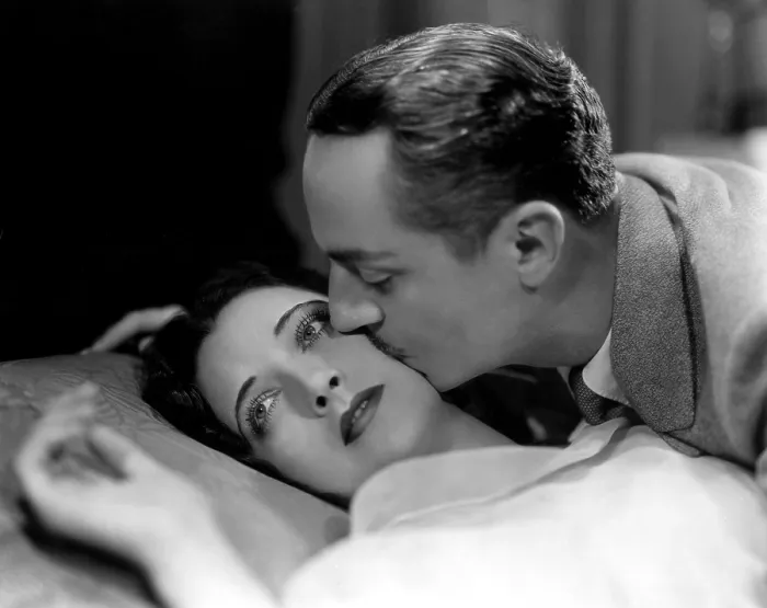 Framed Print : ONE WAY PASSAGE, Kay Francis, William Powell, 1932, kissing