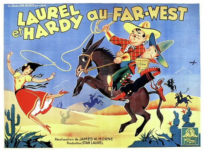 Framed Print : WAY OUT WEST, (aka LAUREL ET HARDY AU FAR-WEST), right: Oliver Hardy, Stan Laurel on French poster art, 1937