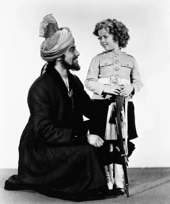 Framed Print : WEE WILLIE WINKIE, from left, Cesar Romero, Shirley Temple, 1937, 20th Century Fox, TM & Copyright / courtesy Everett Collection