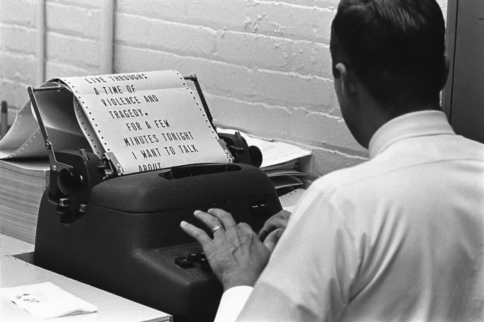 Framed Print : A White House staffer types President Lyndon Johnson's address for a 1960s teleprompter. The text is from a televised address concerning civil unrest in American cities