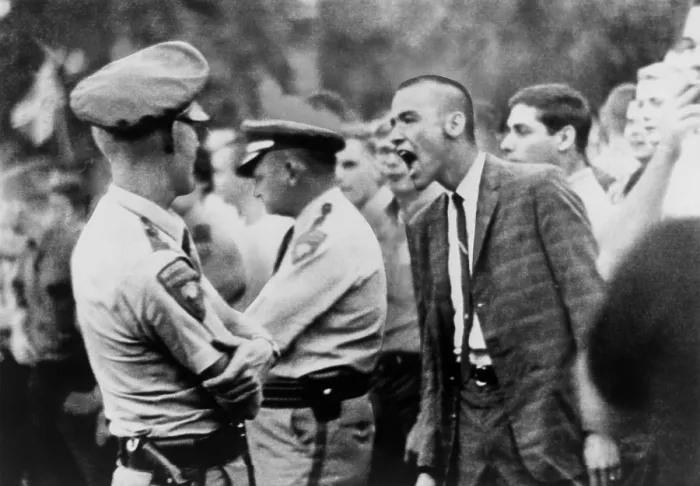 Framed Print : A White student shouts insults at United States marshals enforcing federal orders to protect James Meredith as he registers for classes at the University of Mississippi. Sept Framed Print : A White student shouts insults at United States marshals enforcing federal orders to protect James Meredith as he registers for classes at the University of Mississippi. Sept