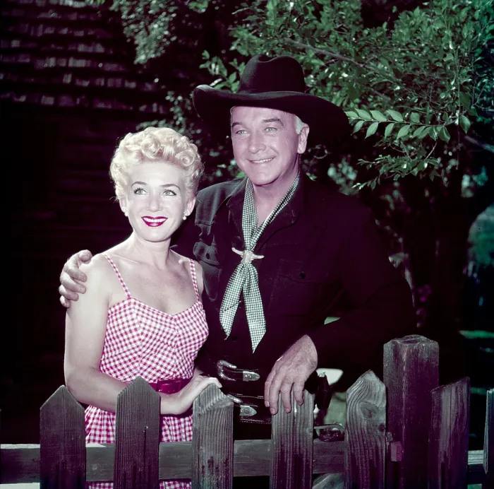Framed Print : William Boyd (right), in his HOPALONG CASSIDY costume, with his wife, Grace Bradley, 1953