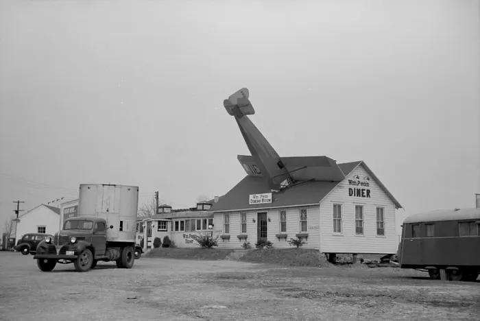 Framed Print : William Penn Diner on Route 40, Delaware, April 1939. The diner was close to the local airport and the airplane crashed into the roof is fake. Photo by Arthur Rothstein