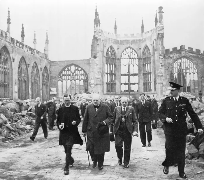 Framed Print : Winston Churchill (1874-1965), walks with members of the Anglican clergy through the ruins of Coventry Cathedral which was destroyed by the German bombing on November 15, 1940
