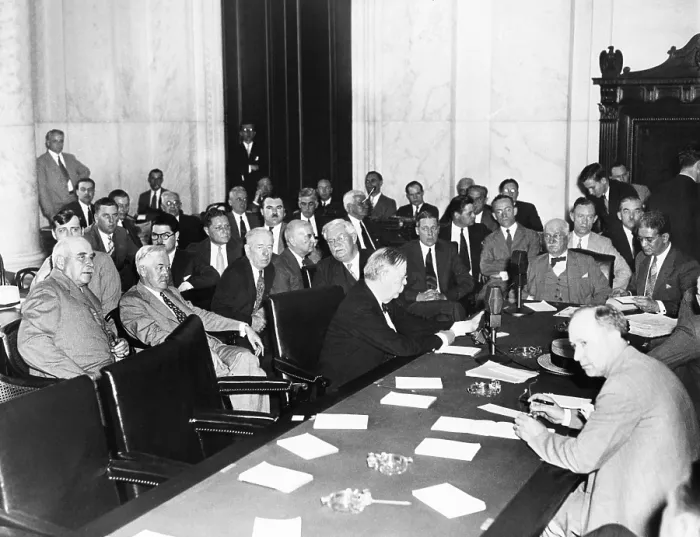Framed Print : The witnesses and Senators at the Senate Banking and Currency Committee hearing. May 26, 1933. J.P. Morgan was seated at far left in the Caucus Room of the Senate Office Building
