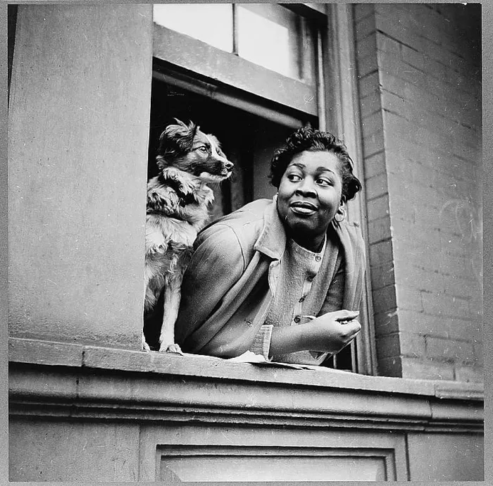 Framed Print : Woman with her dog in Harlem, New York City, May 1943
