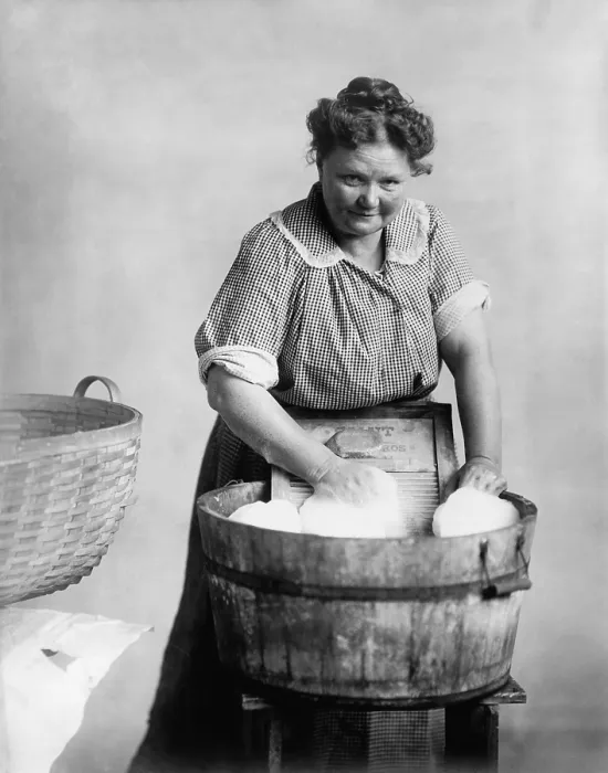 Framed Print : Woman doing laundry in wooden tub and metal washboard, ca. 1905