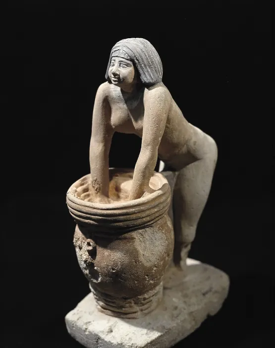Framed Print : Woman making beer. ca. 2465 BC. Servant preparing beer. Egyptian art. Old Kingdom. Terra-cotta. EGYPT. Cairo. Egyptian Museum. Proc: EGYPT. Saqqara