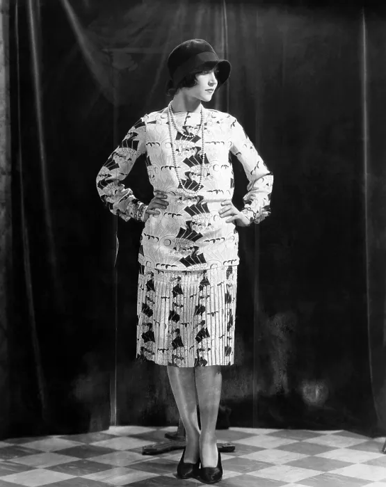 Framed Print : A woman models a silk crepe blouse and skirt, circa 1927 Framed Print : A woman models a silk crepe blouse and skirt, circa 1927