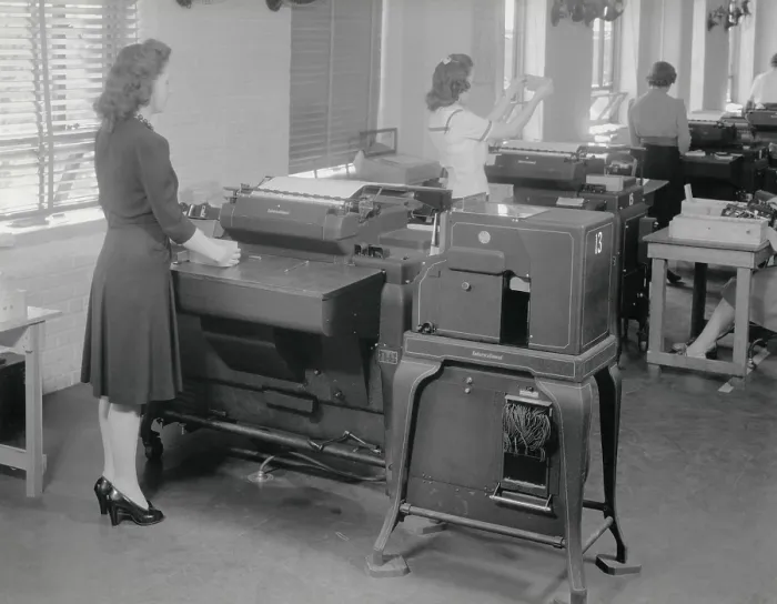 Framed Print : A woman operates one of 12 IBM computers in use during the 1940 Census