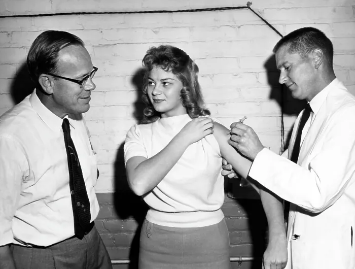 Framed Print : A woman receiving a vaccine, circa 1950s. Courtesy: CSU Archives / Everett Collection