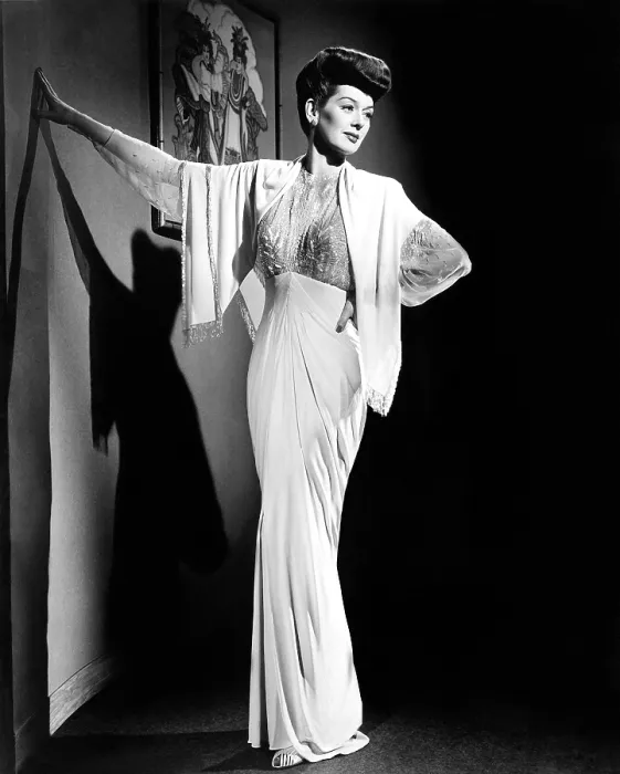 Framed Print : WHAT A WOMAN!, Rosalind Russell, in a crystal-beaded jersey gown by Travis Banton, 1943