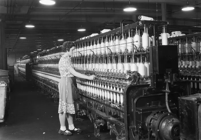 Framed Print : Woman standing at long row of bobbins, at a textile factory. Millville, N.J. 1936. Photo by Lewis Hine. - (BSLOC_2015_1_172)