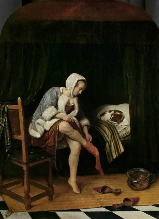 Framed Print : Woman at Her Toilet, by Jan Steen, 1655-60, Dutch painting, oil on panel. Young woman pulling off a stocking as she undresses