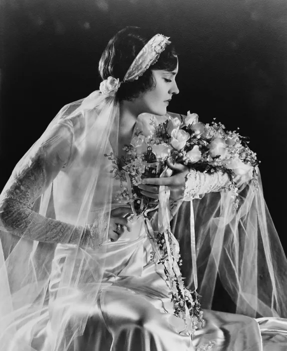 Framed Print : Woman in wedding gown, holding flowers, 1932. (BSLOC_2015_16_247)