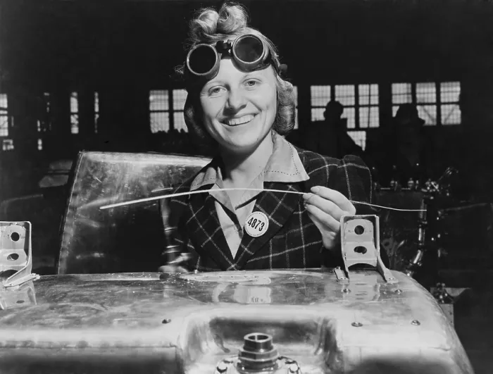 Framed Print : Woman welding a fuel tank for a Hawker Hurricane fighter airplane at Fort William, Ontario, Canada. 1941. World War 2. (BSLOC_2014_10_219)
