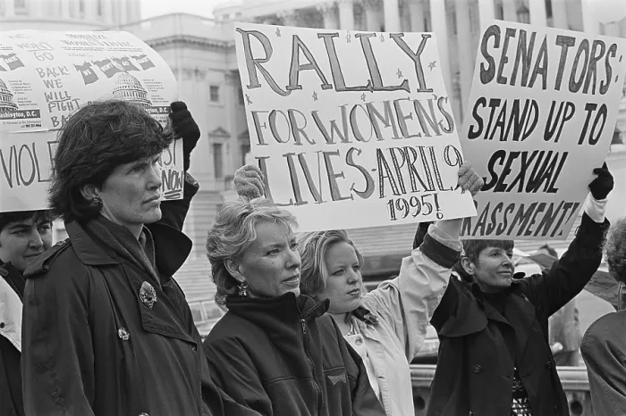 Framed Print : Women outside the U.S. Capitol holding signs against sexual harassment, April 1, 1995. At this time Sen Framed Print : Women outside the U.S. Capitol holding signs against sexual harassment, April 1, 1995. At this time Sen