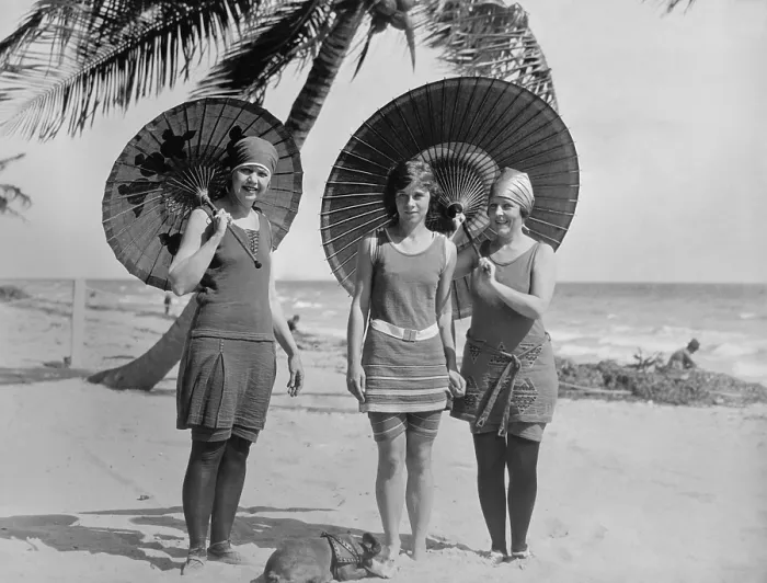 Framed Print : Women pose in bathing suits at an American east coast beach between 1910-1920. The younger woman in the center has bare legs, but the others wear stockings. (BSLOC_2015_17_201) Framed Print : Women pose in bathing suits at an American east coast beach between 1910-1920. The younger woman in the center has bare legs, but the others wear stockings. (BSLOC_2015_17_201)