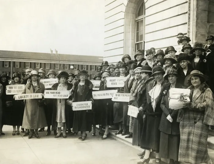 Framed Print : Women Suffragettes holding placards with political activist slogans in 1920 Framed Print : Women Suffragettes holding placards with political activist slogans in 1920