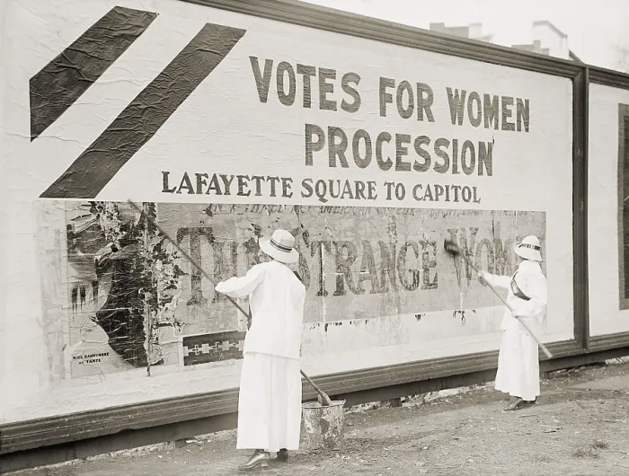 Framed Print : Women suffragists cover a billboard to advertise their Washington, D.C. parade Framed Print : Women suffragists cover a billboard to advertise their Washington, D.C. parade