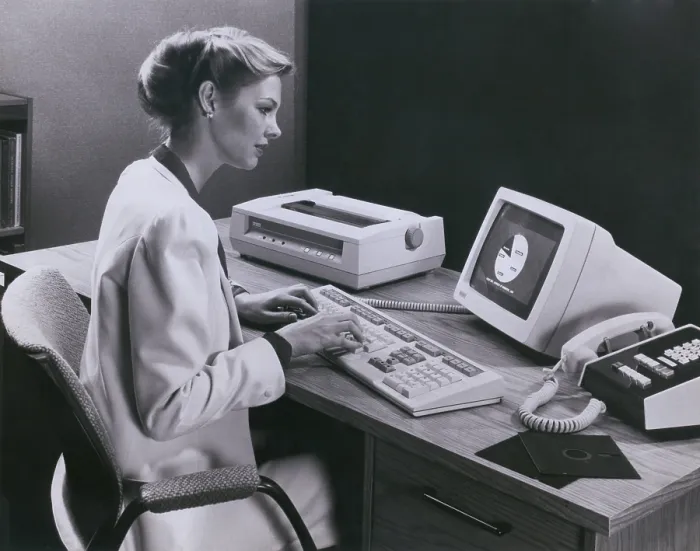 Framed Print : Women using an early personal computer made by the Digital Equipment Corporation of Maynard Massachusetts in 1982