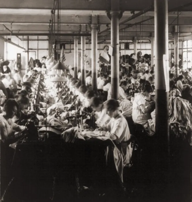Framed Print : Women working at sewing machines in factory in Leicester, England. 1923