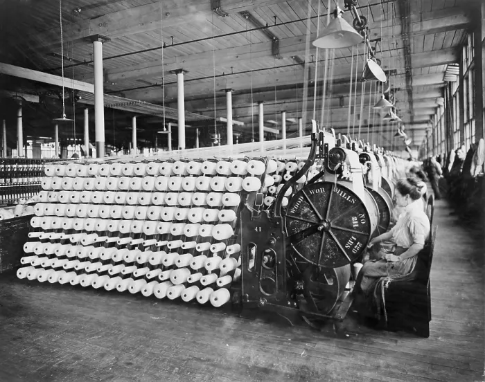 Framed Print : Women working at textile machines, beaming and inspecting yarn, at the American Woolen Company, Boston
