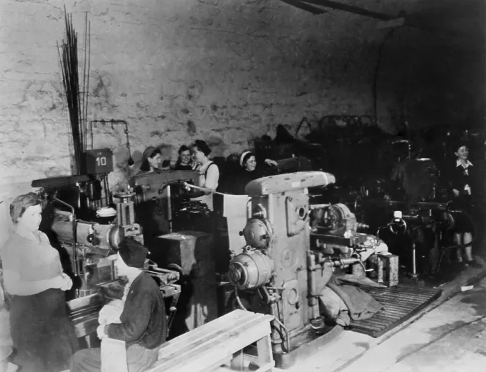 Framed Print : Women working in an underground German armament factory in 1945. It was located in an unused railway tunnel. World War 2. (BSLOC_2014_8_93) Framed Print : Women working in an underground German armament factory in 1945. It was located in an unused railway tunnel. World War 2. (BSLOC_2014_8_93)