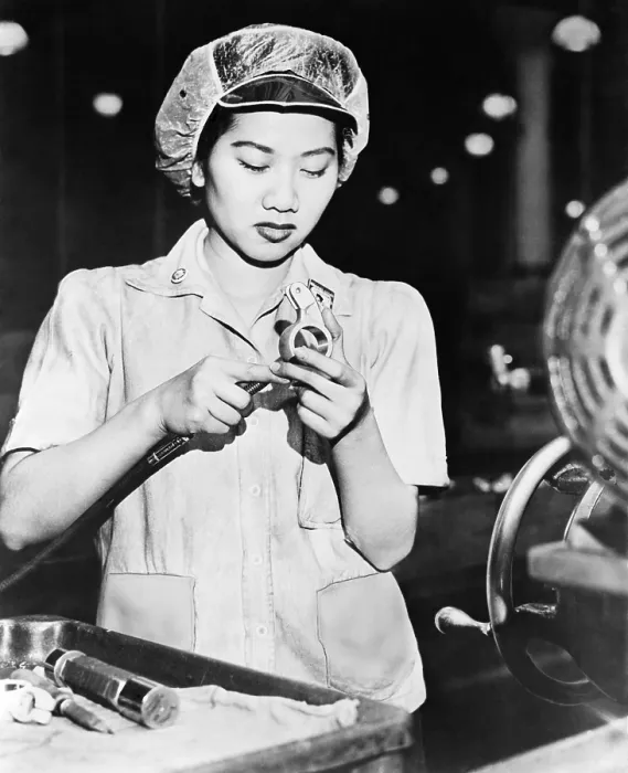 Framed Print : Wong Ruth Mae Moy working on an American aircraft engine part. She is a young Chinese women who survived the Canton bombings. March 1943. World War 2. (BSLOC_2014_10_213)