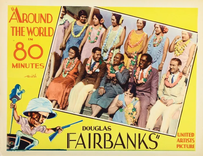 Framed Print : AROUND THE WORLD IN 80 MINUTES, lobbycard, director Douglas Fairbanks (hand on neck), Duke Kahanamoku (purple suit), director Victor Fleming (front right), 1931