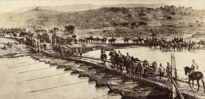Framed Print : World War 1 in Africa. British Empire artillery crossing a pontoon bridge across a stream. At right the horses are watered before resuming the march in the African heat. Ca