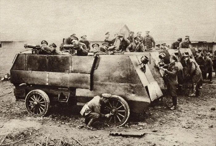 Framed Print : World War 1 Armored vehicles. Gunners and mechanics of the Canadian Motor Machine Detachment cleaning up their armored cars after a successful action on the Somme Front