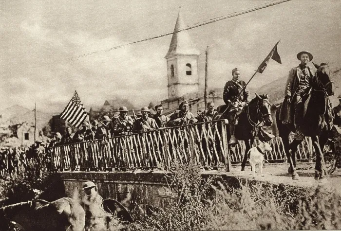 Framed Print : World War 1: Battle of St. Mihiel. Company of American Engineers, with colors flying, passing through the French town of Nonsard. Sept. 12-16, 1918. (BSLOC_2013_1_202)