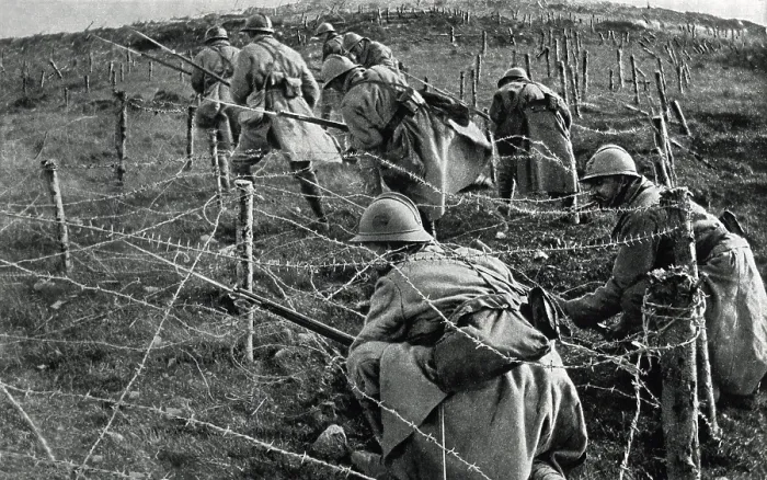 Framed Print : World War 1: Battle of Verdun. French soldiers crawling through their own barbed wire entanglements as they begin an attack on enemy trenches. April-June, 1916. (BSLOC_2013_1_100)