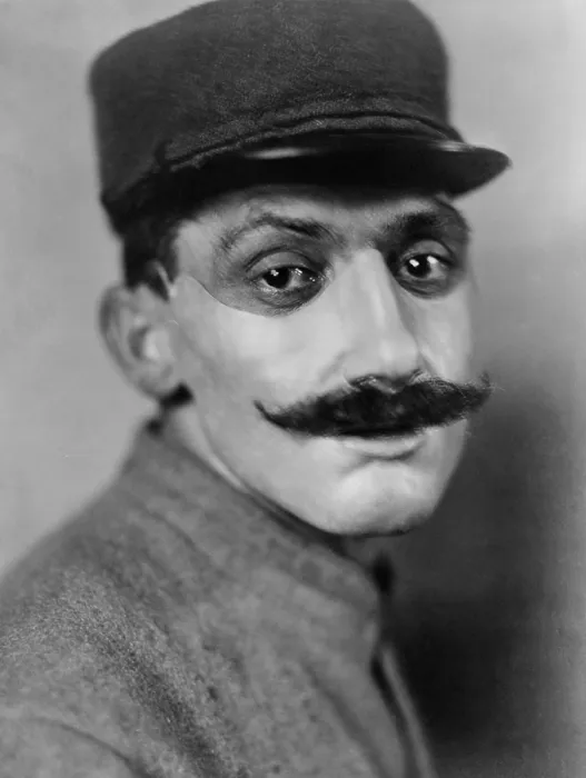 Framed Print : World War 1. French soldier, whose face was disfigured in World War I, wearing a mask of sculpted and painted copper made by American artist Anna Coleman Ladd. July 1918 Framed Print : World War 1. French soldier, whose face was disfigured in World War I, wearing a mask of sculpted and painted copper made by American artist Anna Coleman Ladd. July 1918
